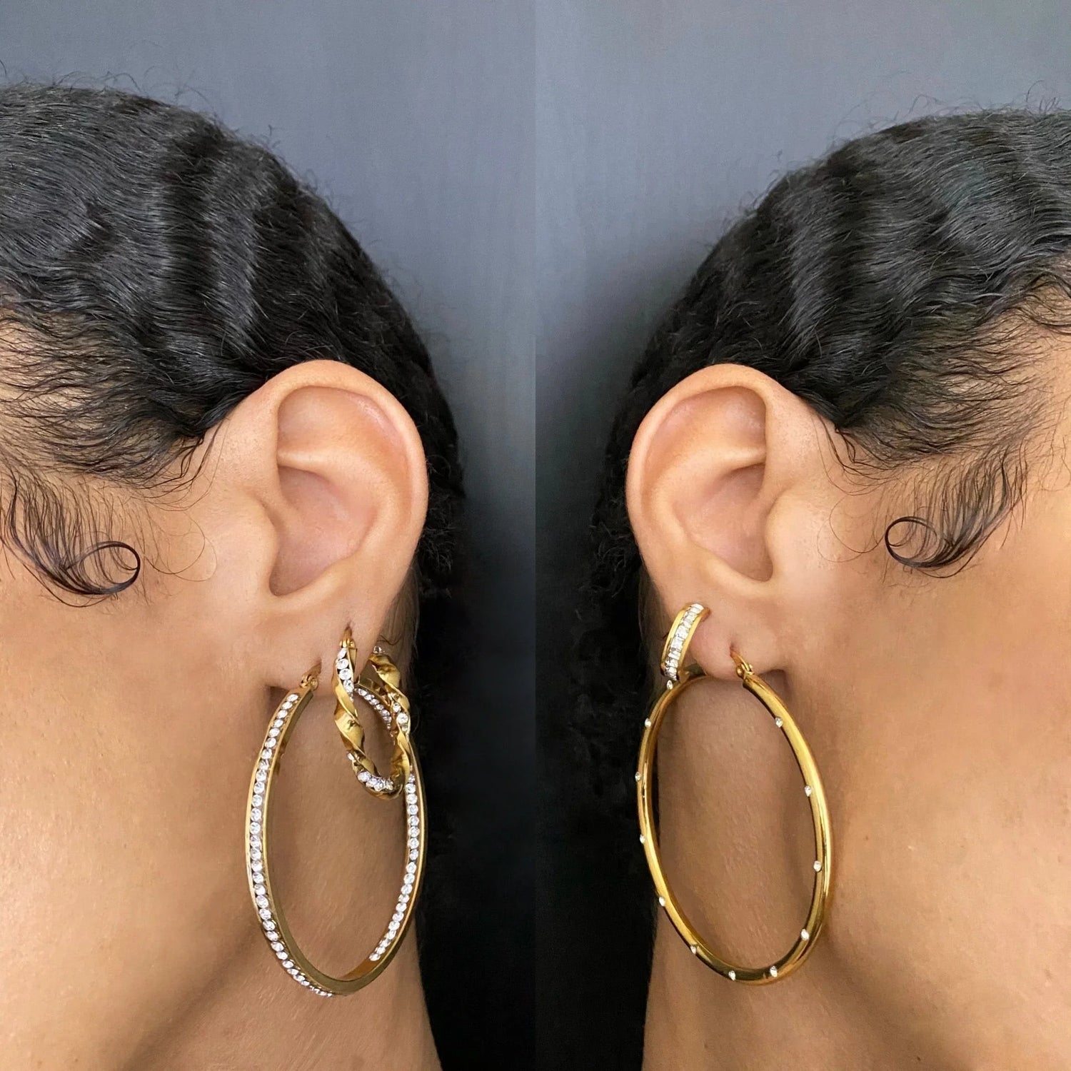 Close-up of ears wearing stylish gold hoop earrings with embedded crystals against black background
